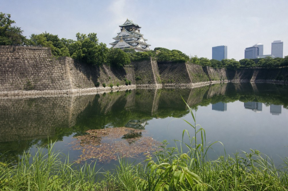 Osaka Castle white tower seen across the outer moat