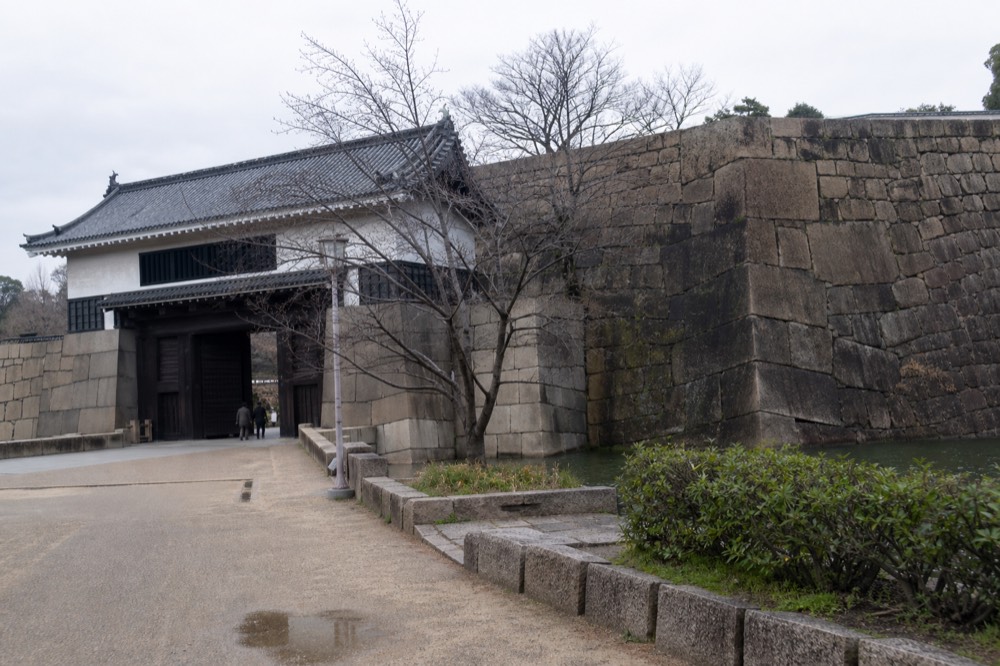 Stone wall and moat of Osaka Castle with the Otemon gate area in view